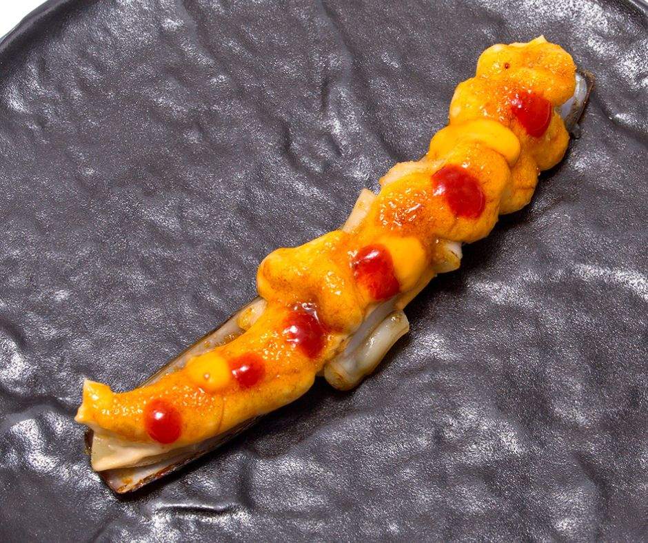 Tapa de La Barra de Pepe el Torrao: navaja flambeada.